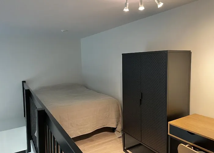 High-Ceilinged Apartment With Balcony