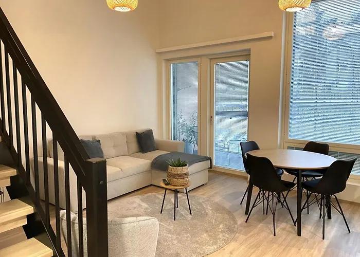 High-Ceilinged Apartment With Balcony